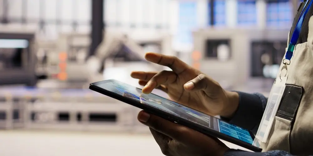 close-up-engineer-using-tablet-design-solar-panels-factory-layouts